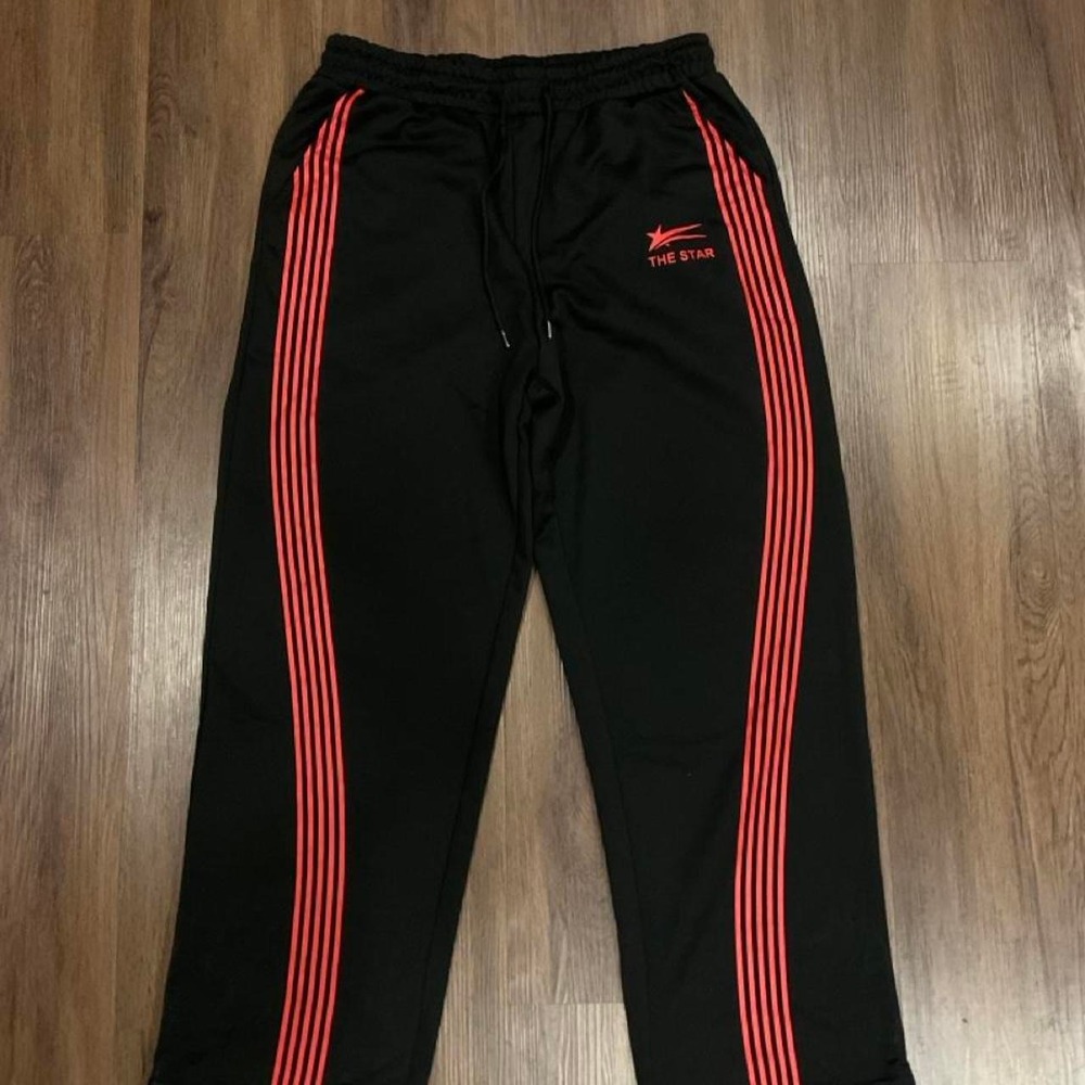The star black sweatpants with red stripes